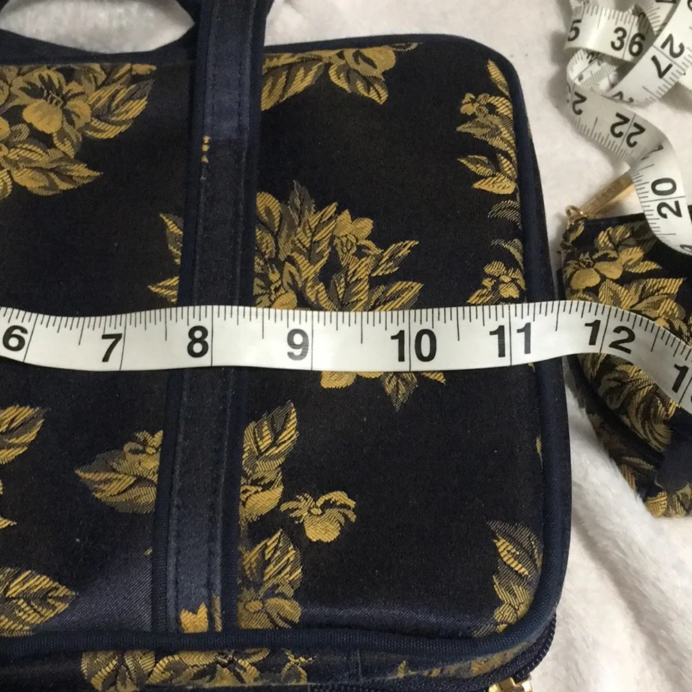 Celebrity travel bag and matching makeup bag. Navy blue with gold flowers